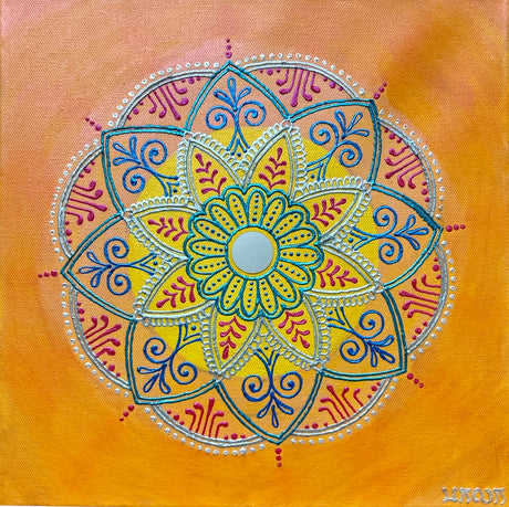 Colorful mandala design on a yellow background